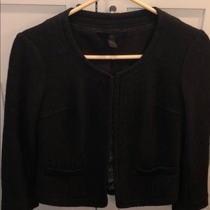 Wool jacket with green detail by hook eye closures